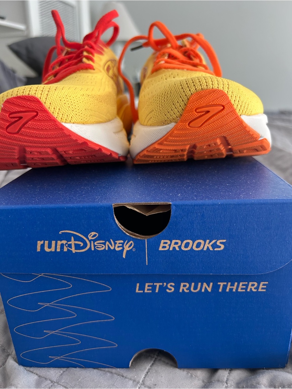 Brooks Yellow Running Shoes with Red & Orange Soles